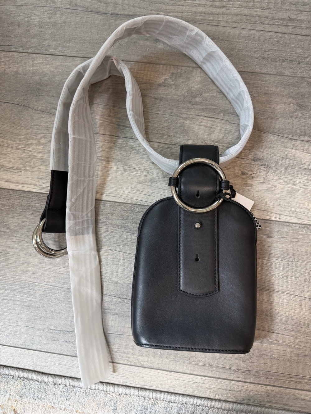 Black Leather Crossbody Phone Bag with Silver Ring Accent